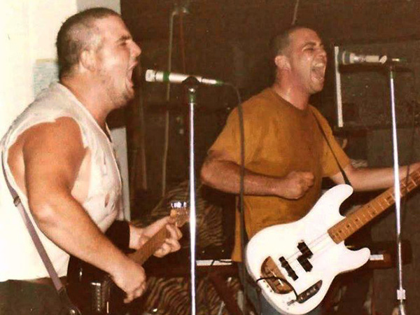 d boon + mike watt (l to r) at foolkillers in kansas city, mo on july 10, 1984