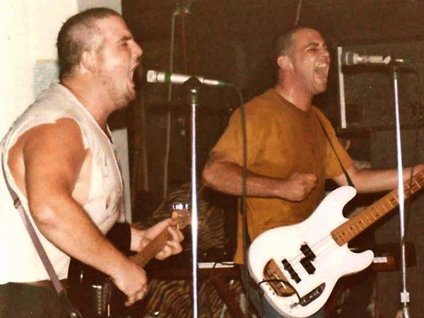 d boon + mike watt (l to r) at foolkillers in kansas city, mo on july 10, 1984