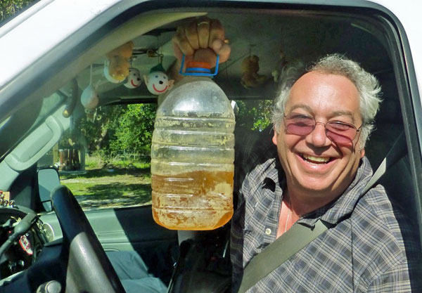 watt in the boat w/his piss jug in waldo, fl on october 25, 2014 - photo by bill bryson