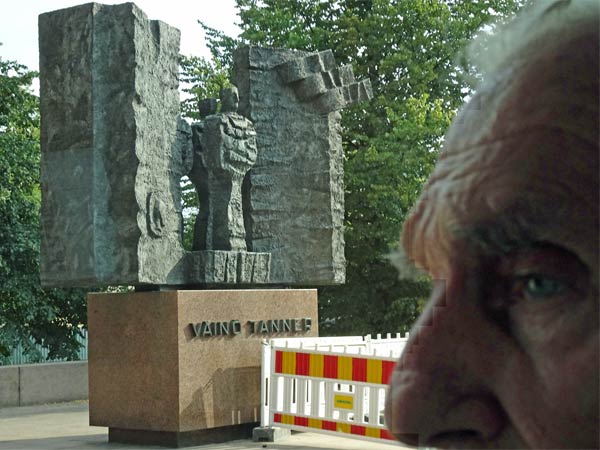 monument (and part of ted falconi's face) near kuudes linja in helsinki, finland on august 17, 2019