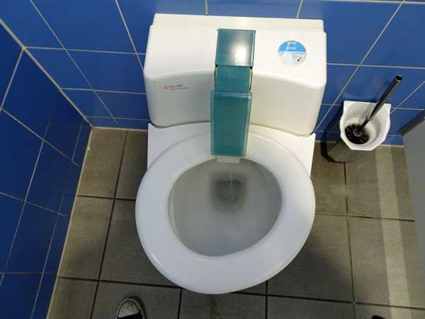 self-cleaning toilet in operation at a fuel station in germany on august 9, 2019