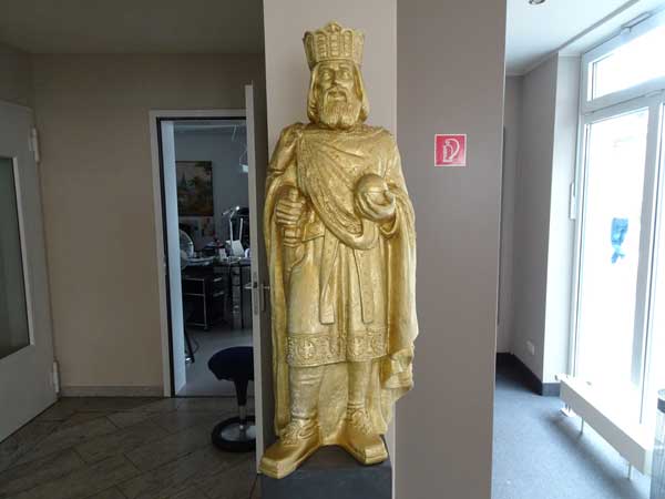 statue of charlemagne in the 'art aachen superior' hotel lobby on august 9, 2019