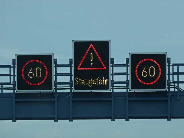 stau (traffic jam) sign on the autobahn, headed for karlsruhe, germany on august 9, 2019
