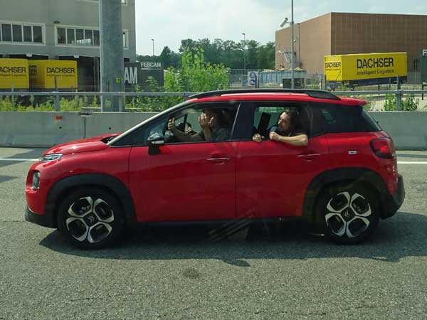 'we are the asteroid' guys in their rented citroen at the swiss/italian border on august 10, 2019