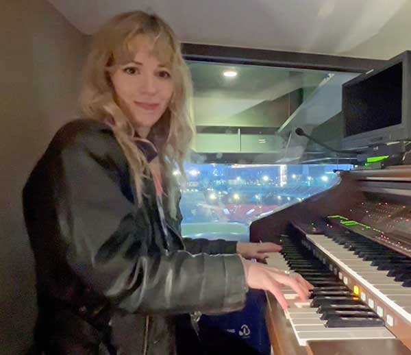 stephen perkins' photo of robin hatch playing the organ at fenway park in boston, ma on march 5, 2024