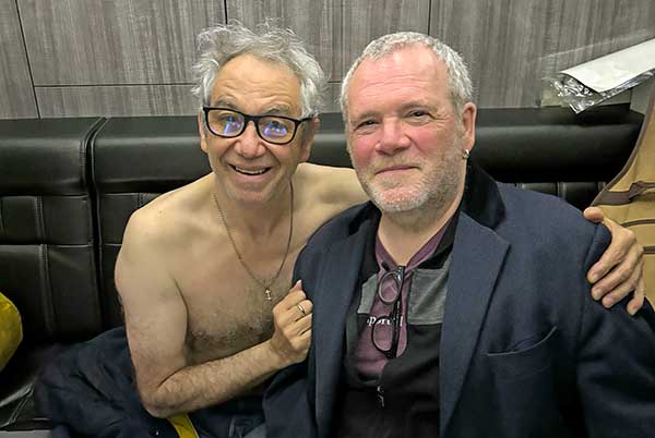 michael james' photo of mike watt (l) + hugo burnham (r) in the back of the tour buss in boston, ma on march 5, 2024