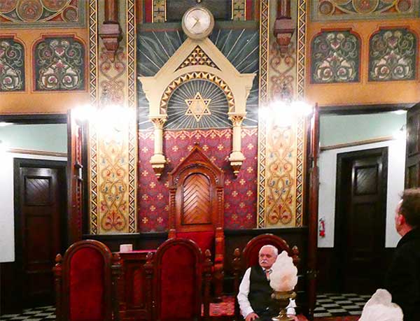 our tour guide + perk in the 'gothic room' of the masonic library and museum of pennsylvania in philadelphia, pa on march 2, 2024