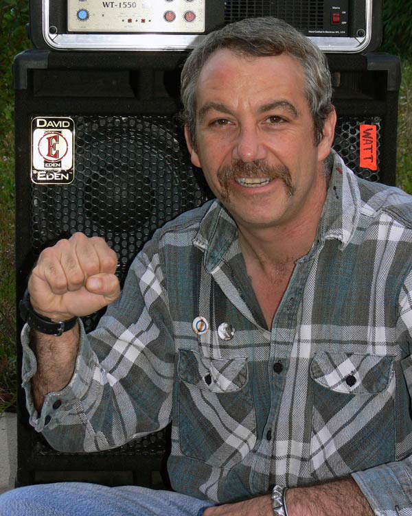 mike watt self-portrait (using autotimer) in front of his amp in front of his prac pad in san pedro, ca on november 1, 2005 mike watt self-portrait (using autotimer) in front of his amp in front of his prac pad in san pedro, ca on november 1, 2005