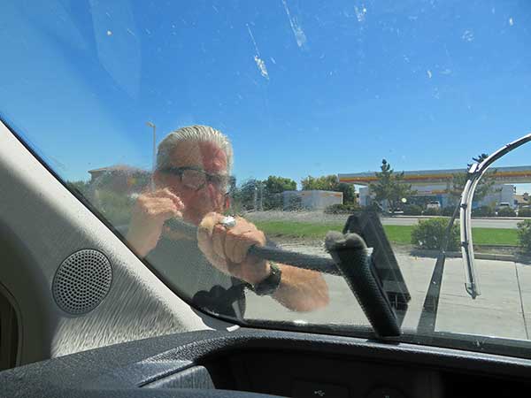 hodge cleaning the windshield of the new boat in williams, ca on september 9, 2023