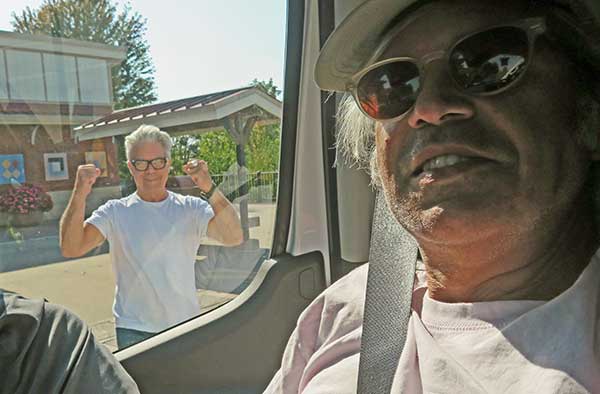 stephen hodges (l) + mike baggetta (r) at a rest stop on the I-70 east of des moines, ia on september 29, 2023