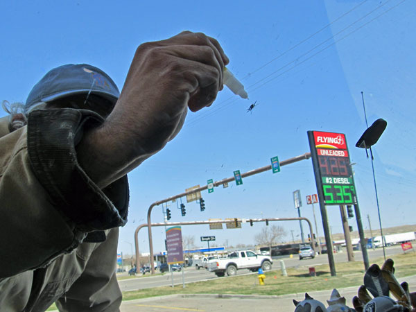 mike baggetta arresting crack in the boat's windshield in rock springs, wy