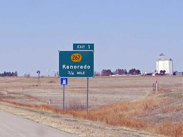 sign for bordertown kanorado on I-70