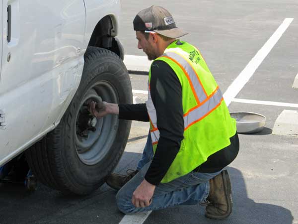 tim helping us change the tire on the boat in wilmington, il