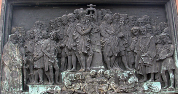 one side of base of gutenberg statue in strasbourg, france