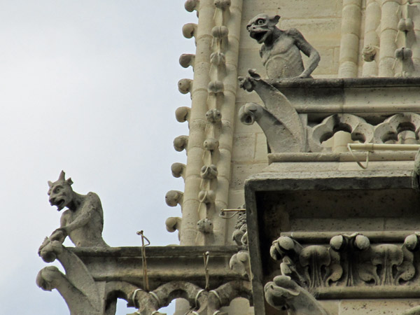 two devils on cathedral notre dame on august 23, 2011