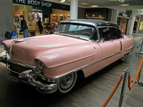 pink 1956 cadillac at frankfurt airport on june 28, 2012