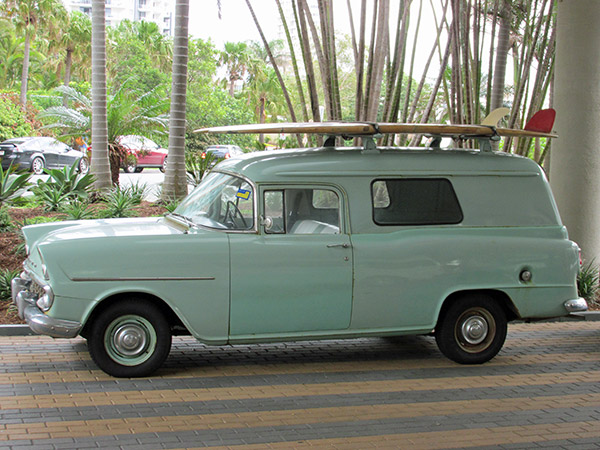 1956 holden panel delivery outside qt hotel in surfer's paradise, australia