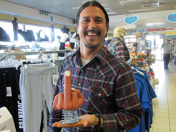 raul morales exploring travelling aid options at filling station near como, italy on march 17, 2014