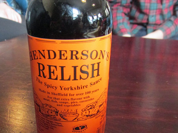 'henderson's relish' spicy sauce at 'the harley' (gigboss max in the background) in sheffield, england on april 17, 2014