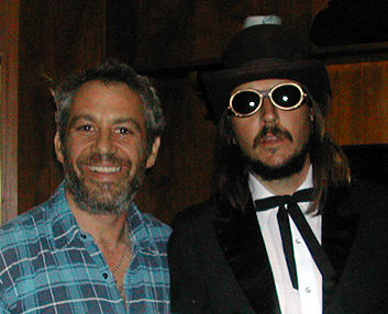 shot of watt and les claypool in 2002